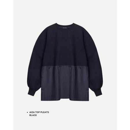 Black pleated top by Maima on a light gray background