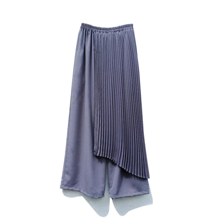 Dark grey pleated pants by Rashawl on a white background