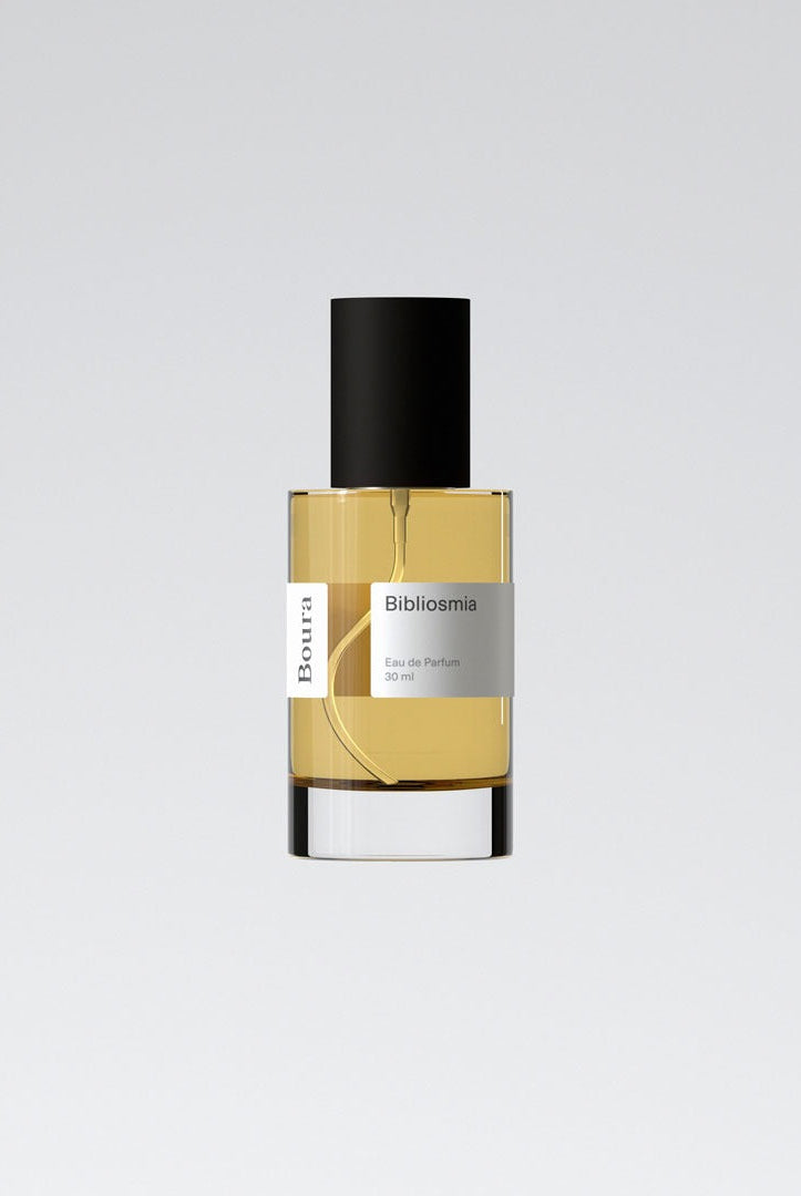 A bottle of perfume with a label that reads 'Blibliosmia - Boura' on a white background.
