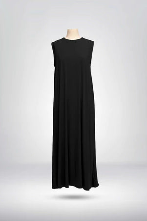 Front view of black sleeveless dress from Muhajir Project on a mannequin against a gray background