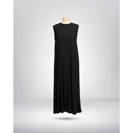 Front view of black sleeveless dress from Muhajir Project on a mannequin against a gray background