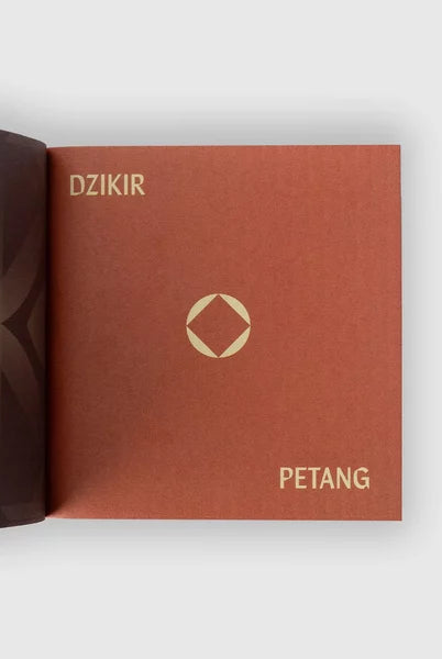 Brown book with 'DZIKIR' and 'PETANG' text from Muhajir Project on a white background