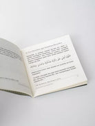Open book with text on a white background