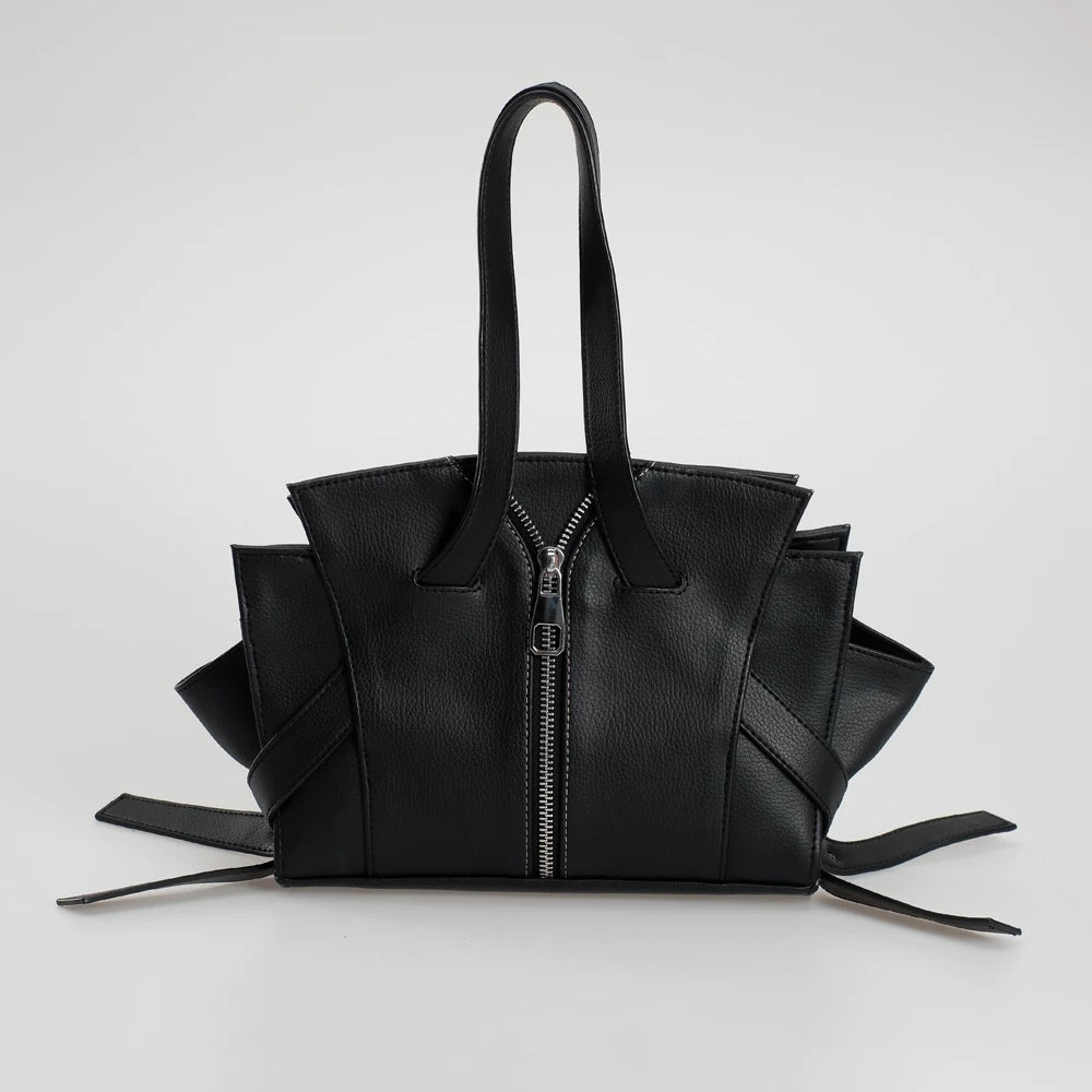 Black leather handbag with unique design by Cekhas on a white background