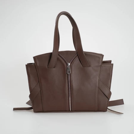 Brown leather handbag with unique design by Cekhas on a white background