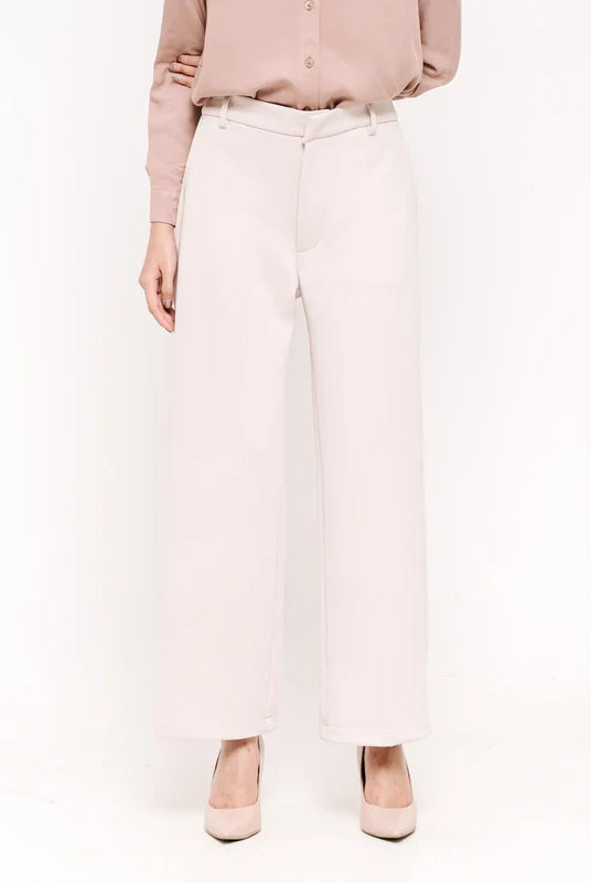 Person wearing ivory culotte pants from Atala Scarves and shirts on a white background