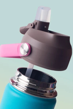 Close-up of a water bottle with a brown and pink lid on a gradient background