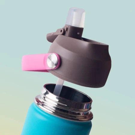 Close-up of a water bottle with a brown and pink lid on a gradient background