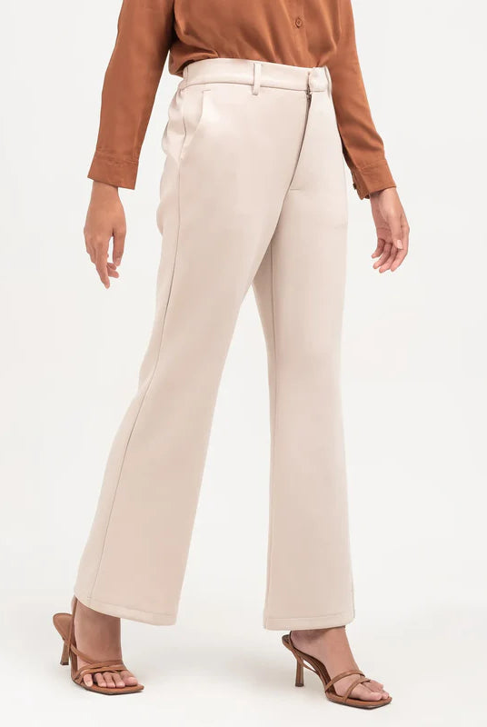 Ivory flare pants from Atala Scarves worn by a person on a white background