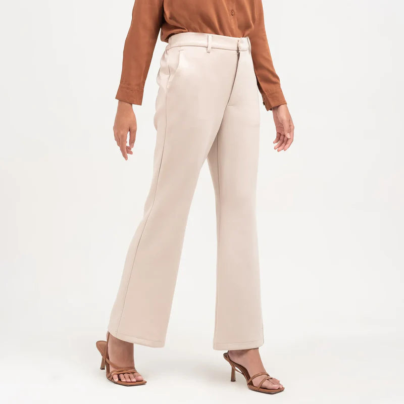 Ivory flare pants from Atala Scarves worn by a person on a white background