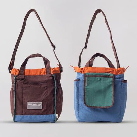 Reversible mini tote bag with different color combinations from Muhajir Project on a white background