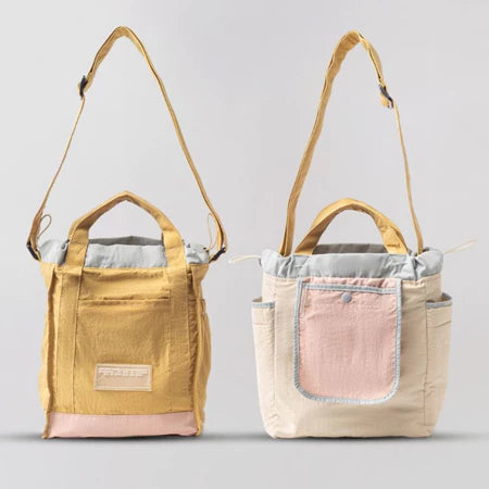 Reversible mini tote bag with different color combinations from Muhajir Project on a white background