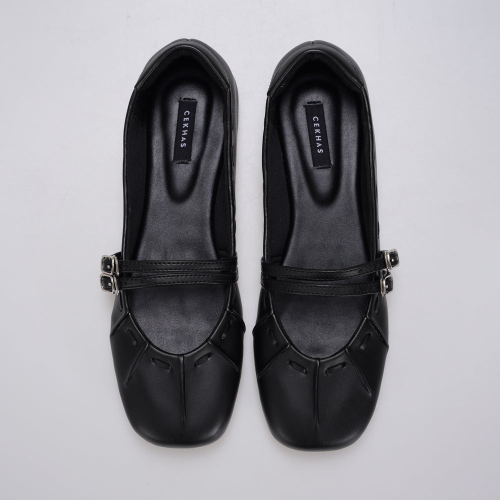 Black Mary Jane flatshoes by Cekhas with double buckle straps and square toe design.