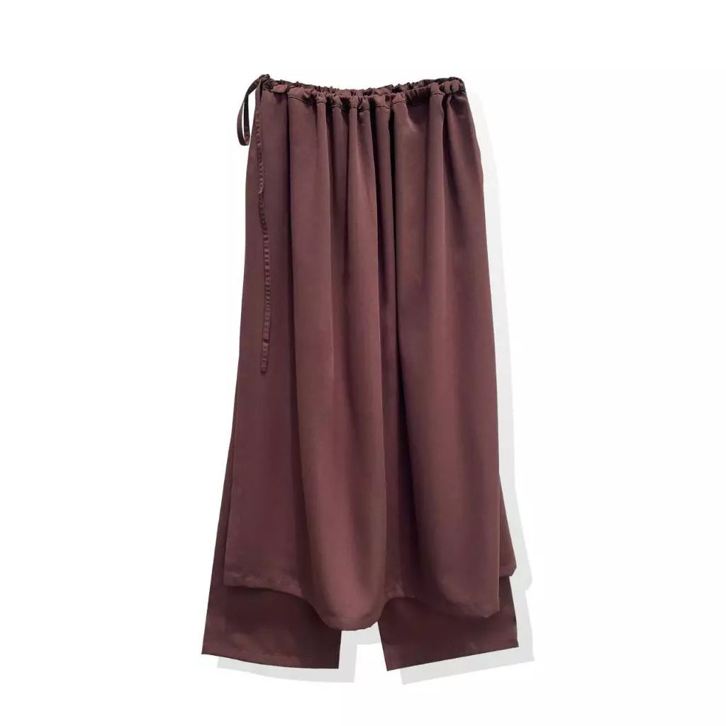 Brown satin pants with drawstring waist by Rashawl on a white background