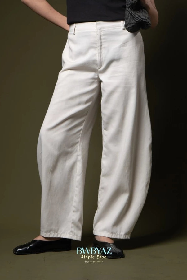 Person wearing white barrel pants and black shoes on a dark background with 'BWBYAZ' branding.