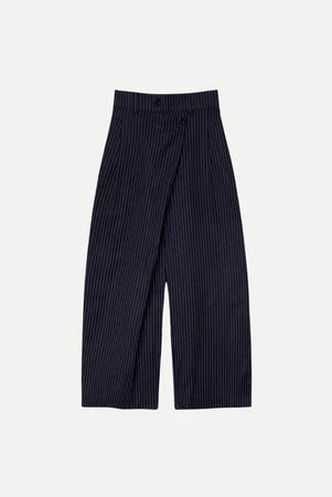 Black striped Maima pants on a light gray background