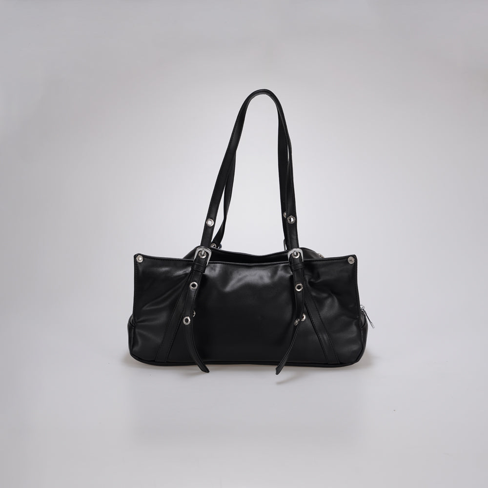 A black leather shoulder bag by Cekhas with silver-tone hardware, shown against a neutral light gray background.