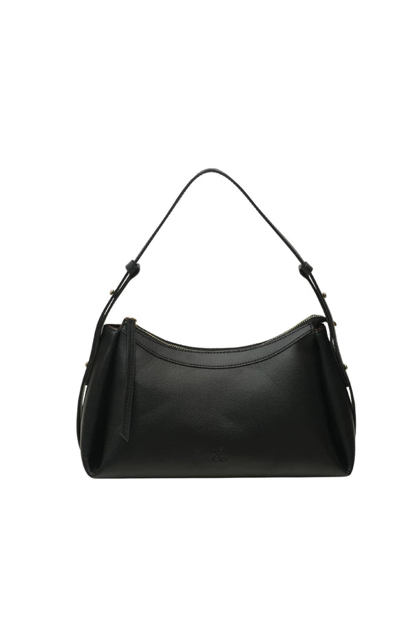 Black woman's handbag by Prior on a white background.
Tas tangan wanita kulit berwarna hitam karya Prior dengan latar belakang putih.