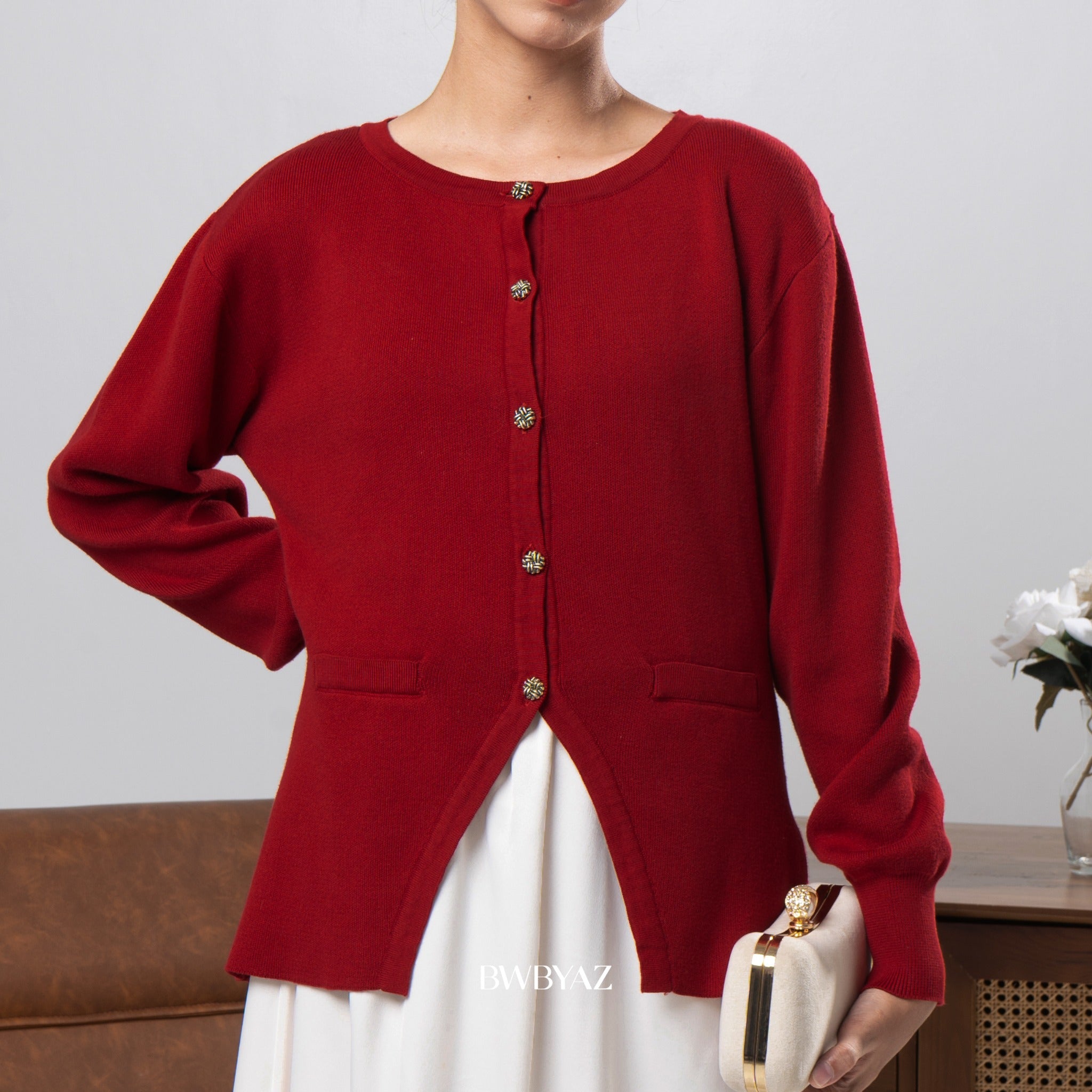 Red cardigan from BWBYAZ worn by a person with a neutral background