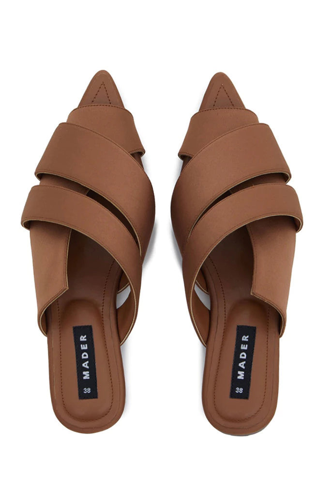 A pair of bronze open toe mules with double strap and low heel