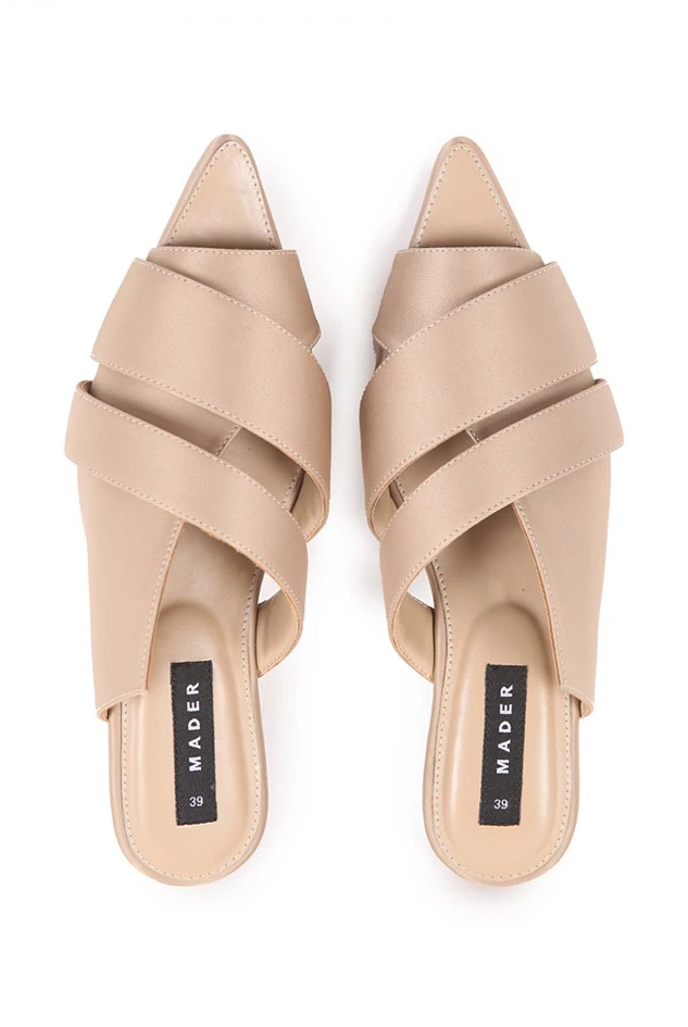 A pair of gold open toe mules with satin finish and double strap across the footbed, displayed on a white background.