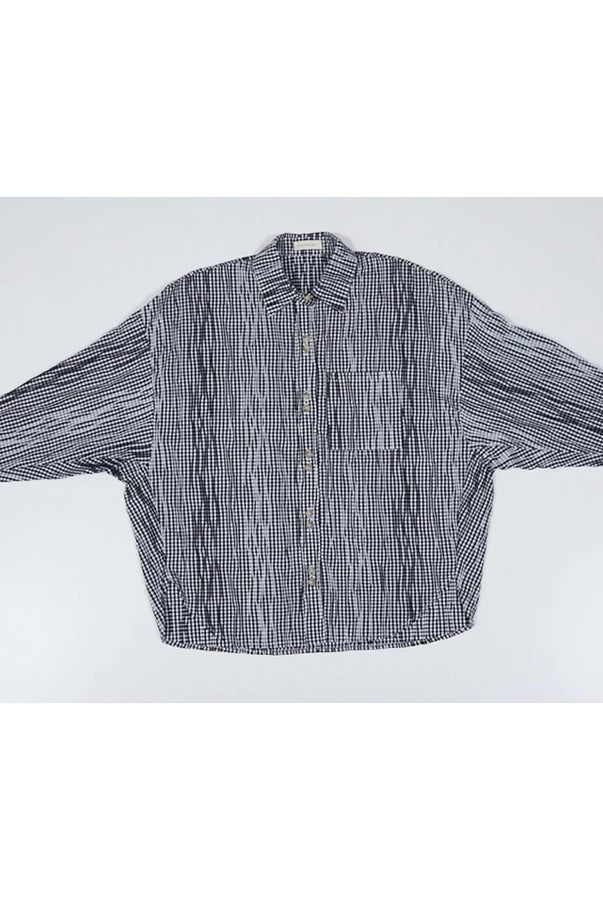 Black and white checkered oversized shirt by Yestoday on a white background