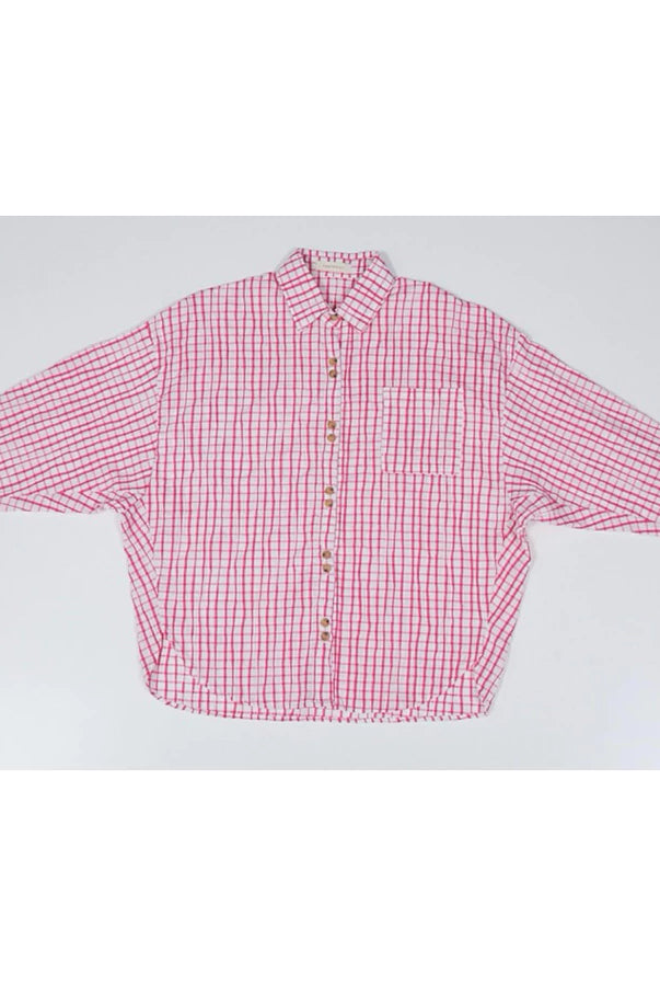 Red and white checkered oversized shirt by Yestoday on a white background