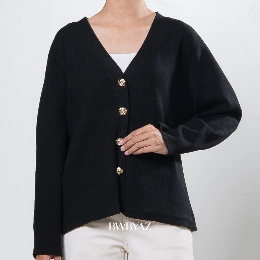 Black cardigan by BWBYAZ with gold buttons worn by a person on a white background