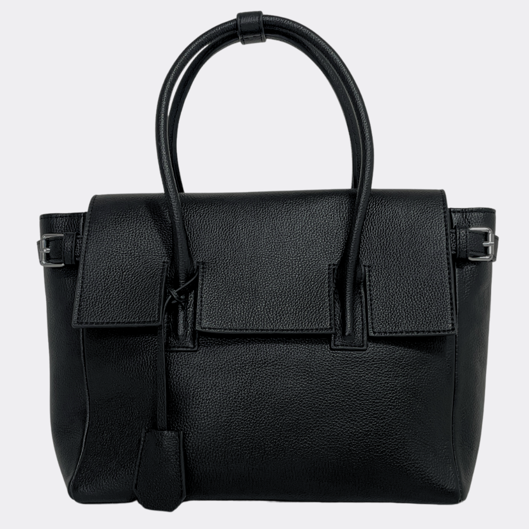 Black grain leather handbag by Aesthetic Pleasure with a strap on a light gray background
