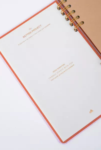 Open notebook with 'The Better Prophet' branding on a white background