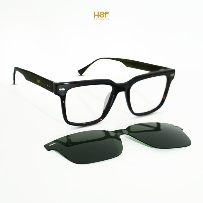 Black eyeglasses with a clip-on black sunglasses by HSF Eyewear on a white background