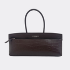 Dark brown baguette handbag with crocodile texture by Aesthetic Pleasure on a white background
