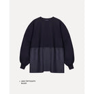 Black pleated top by Maima on a light gray background