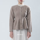 Light brown textured knit cardigan worn by a person on a light gray background, with 'BWBYAZ' branding.