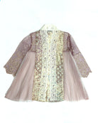 A traditional Indonesian kebaya dress by Kartinis Label featuring long sleeves, organza pleats, and lace details, primarily in a light color with decorative patterns.