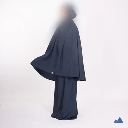 Navy blue prayer hijab with a draped design from Muhajir Project on a white background