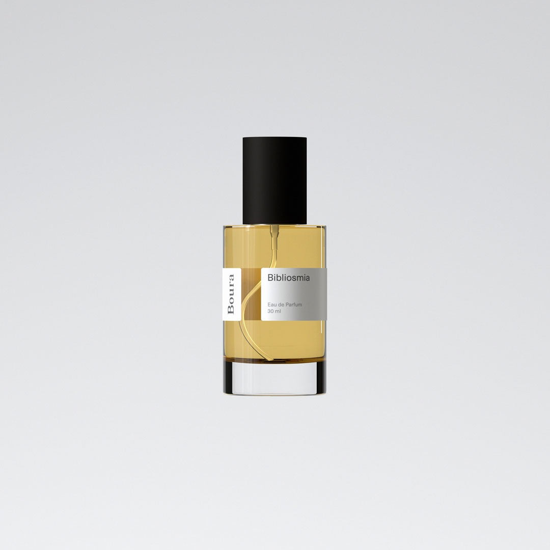 A bottle of perfume with a label that reads 'Blibliosmia - Boura' on a white background.