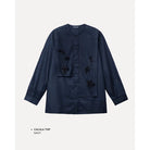 Navy blue shirt by Maima with floral embellishments on a light gray background