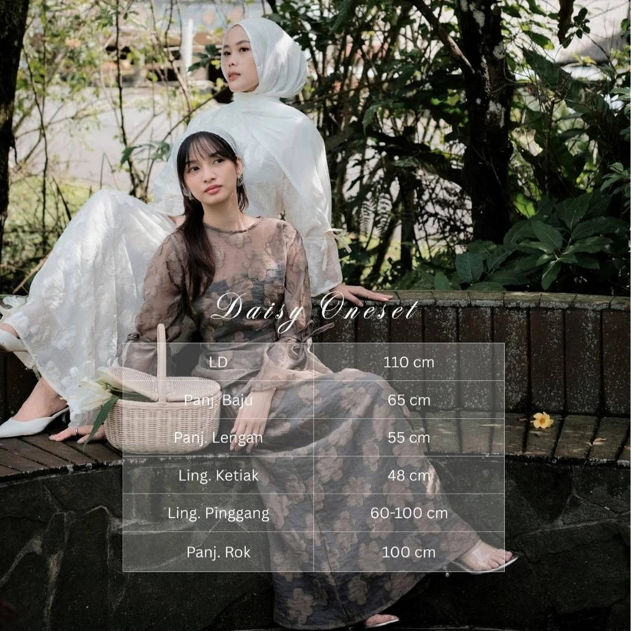 Two women in Daisy Oneset by Renaette sitting outdoors with measurement details overlayed.