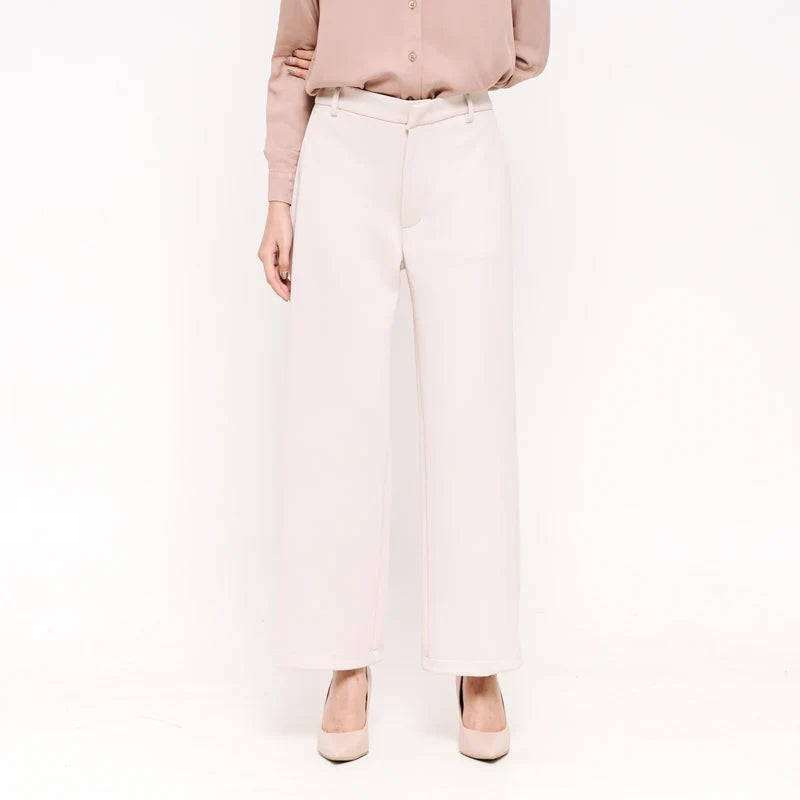 Person wearing ivory culotte pants from Atala Scarves and shirts on a white background