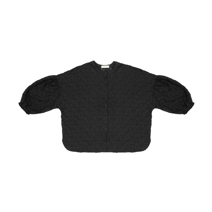 A black textured short-sleeve shirt by Yestoday with puffed balloon sleeves and a button-up front, laid flat on a white background.