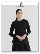 Woman wearing a black blouse by Swifter and skirt on a white background