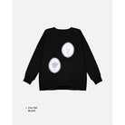 Black t-shirt by Maima with white designs on a light gray background