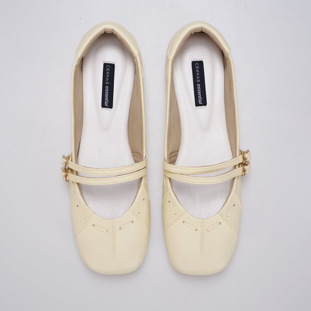 Butter Yellow Mary Jane flatshoes by Cekhas with double buckle straps and square toe design.