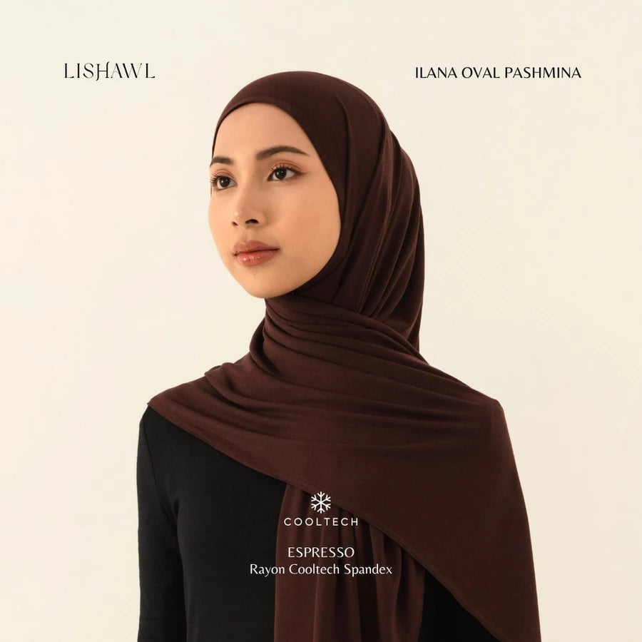 Woman wearing a brown Lishawl Ilana Oval Pashmina by BWBYAZ on a beige background