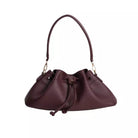 Burgundy shoulder bag with drawstring by Prior on a white background