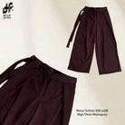 Brown wide-leg culotte pants with a belt on a light beige background, featuring the brand 'Dress Up For Faith'.

Celana kulot lebar berwarna cokelat dengan ikat pinggang pada latar belakang krem muda, menampilkan merek ‘Dress Up For Faith’.
