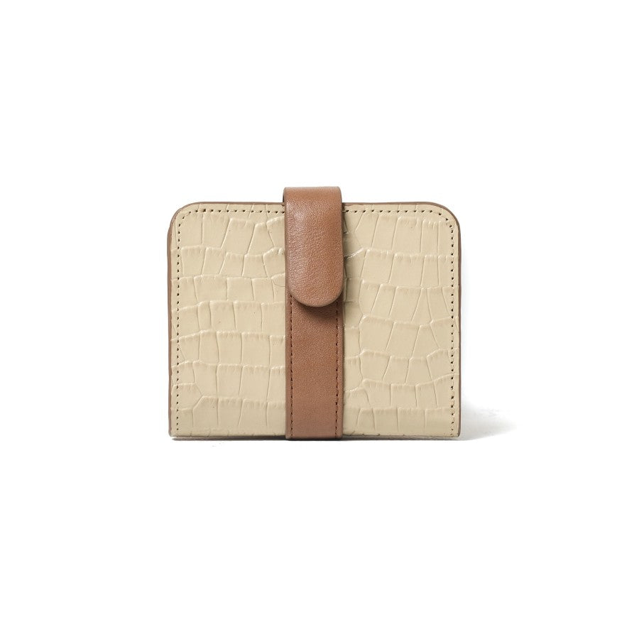 A closed brown bifold wallet from purotti with a textured surface, displayed against a solid background.