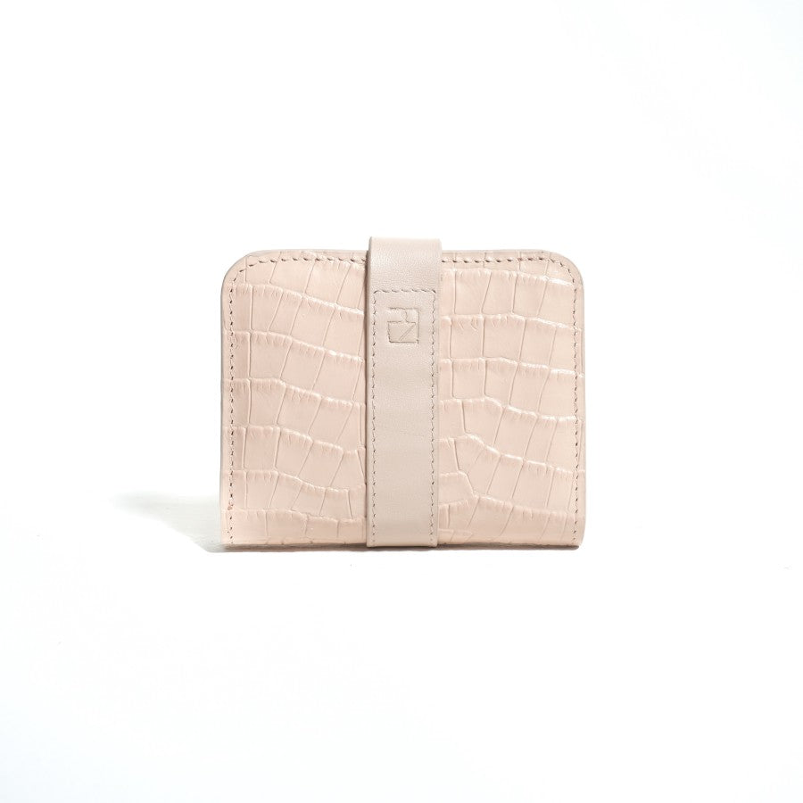 A closed brown bifold wallet from purotti with a textured surface, displayed against a solid background.