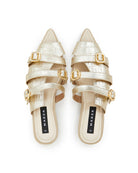 A pair of gold open toe mules with crocodile pattern leather upper and buckle details. The brand's signature outsole is visible.